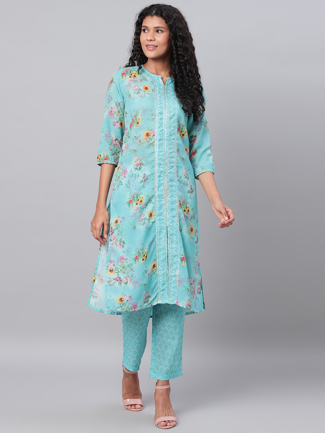 

Myshka Women Blue & Yellow Floral Printed Kurta with Trousers