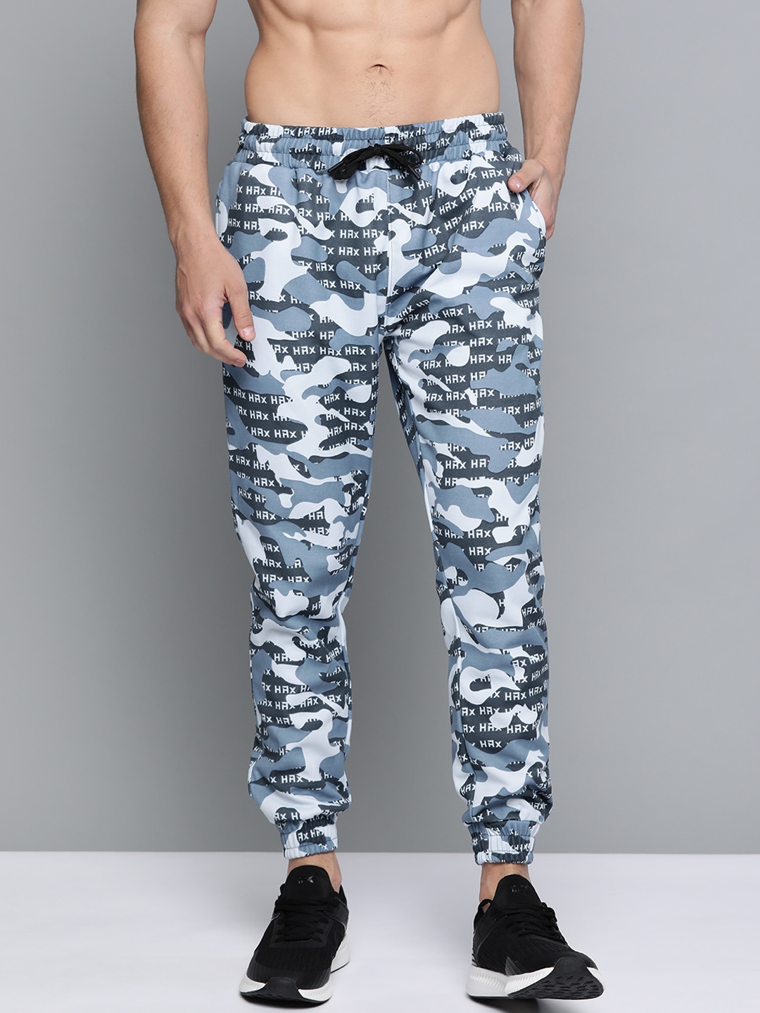 

HRX by Hrithik Roshan Men Blue Wing Printed Skin Fit Rapid-Dry Running Track Pants