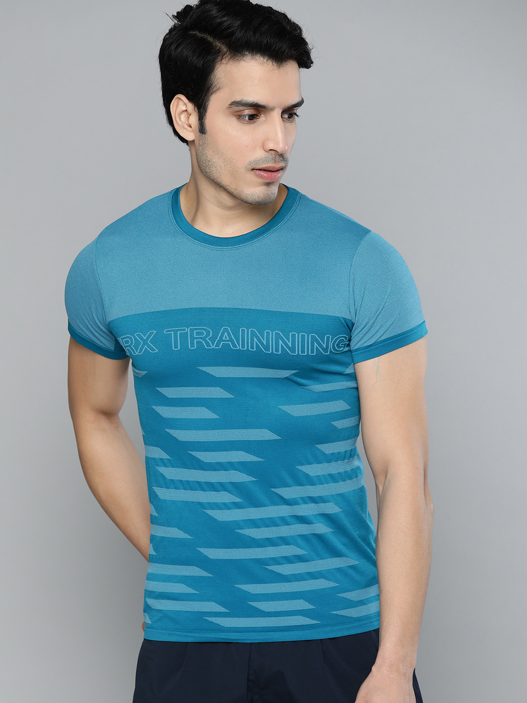 

HRX by Hrithik Roshan Men Teal Melange Self Design Seamless Rapid-Dry Training T-shirt, Blue