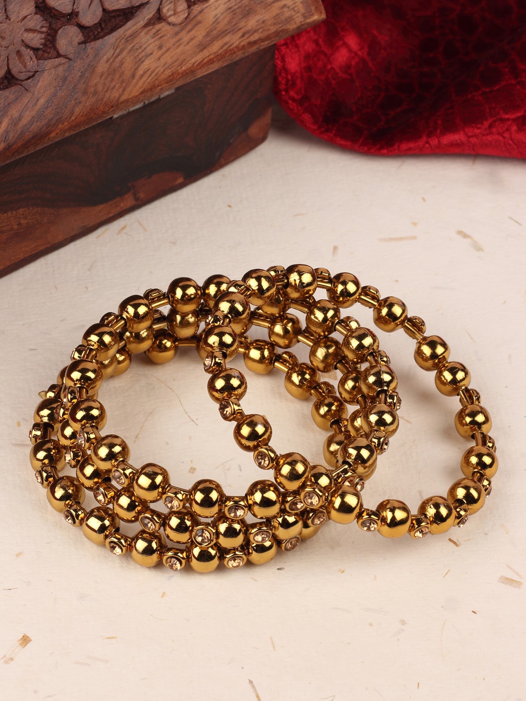 

AccessHer Gold-Toned Set of 4 Brass-Plated Antique Bangles