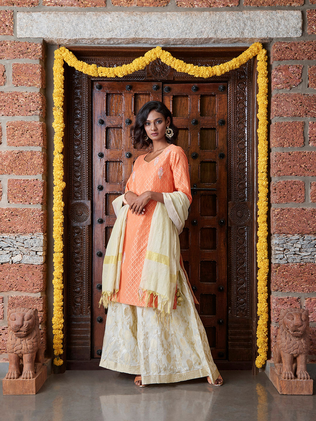 

Biba Women Orange & Off-White Self Design Kurta with Palazzos & Dupatta