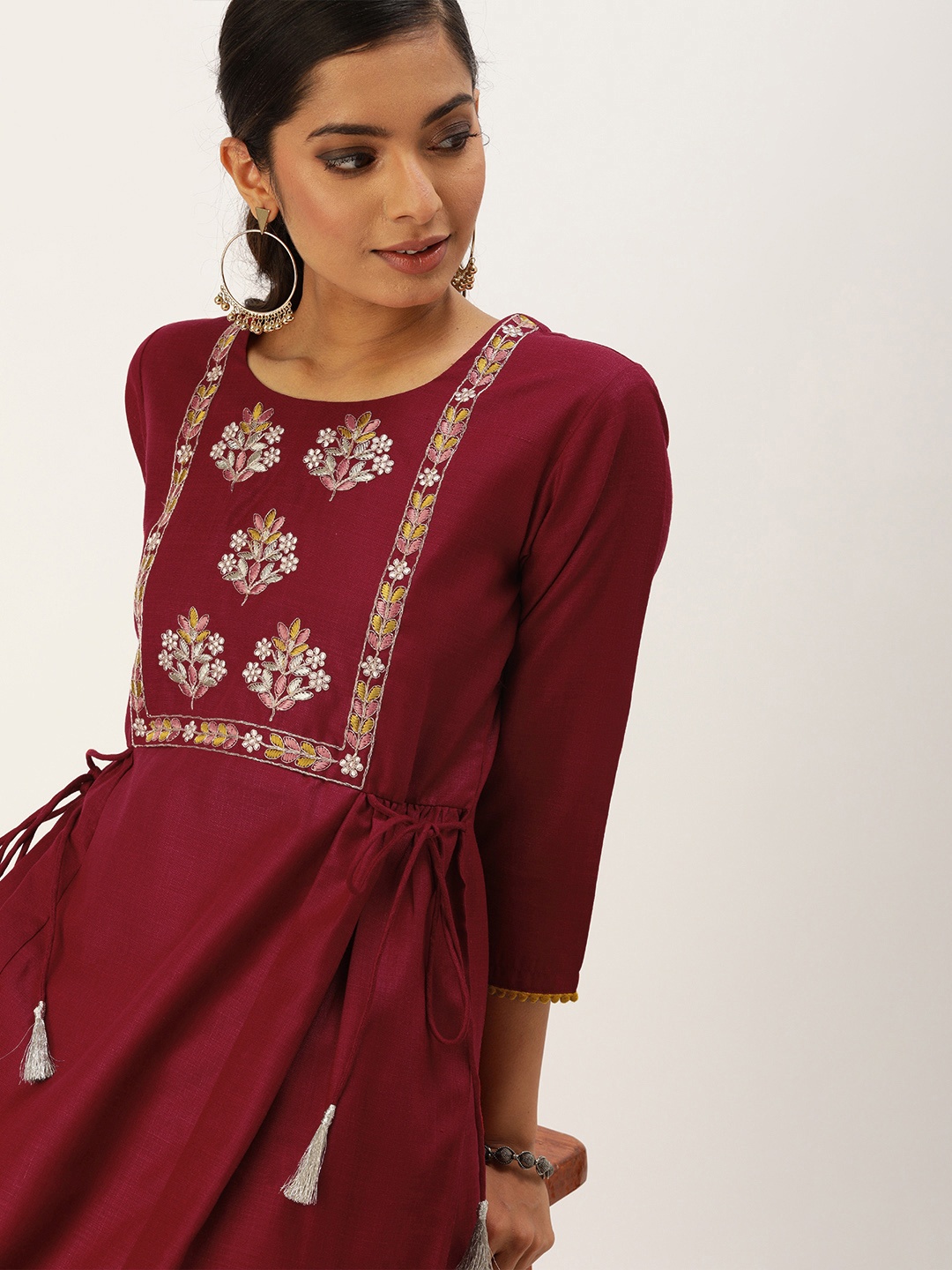 

Varanga Women Maroon Embroidered A-Line Kurta with Waist Tie-Ups