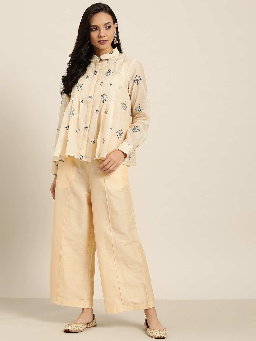 

Sangria Women Cream-Coloured Ethnic Motifs Printed Panelled Sequinned Top with Palazzos