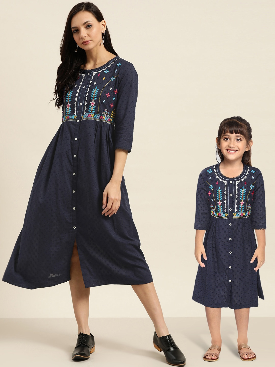 

Sangria Girls Navy Blue & White Self & Yoke Design Pure Cotton Mirror Work A-Line Dress