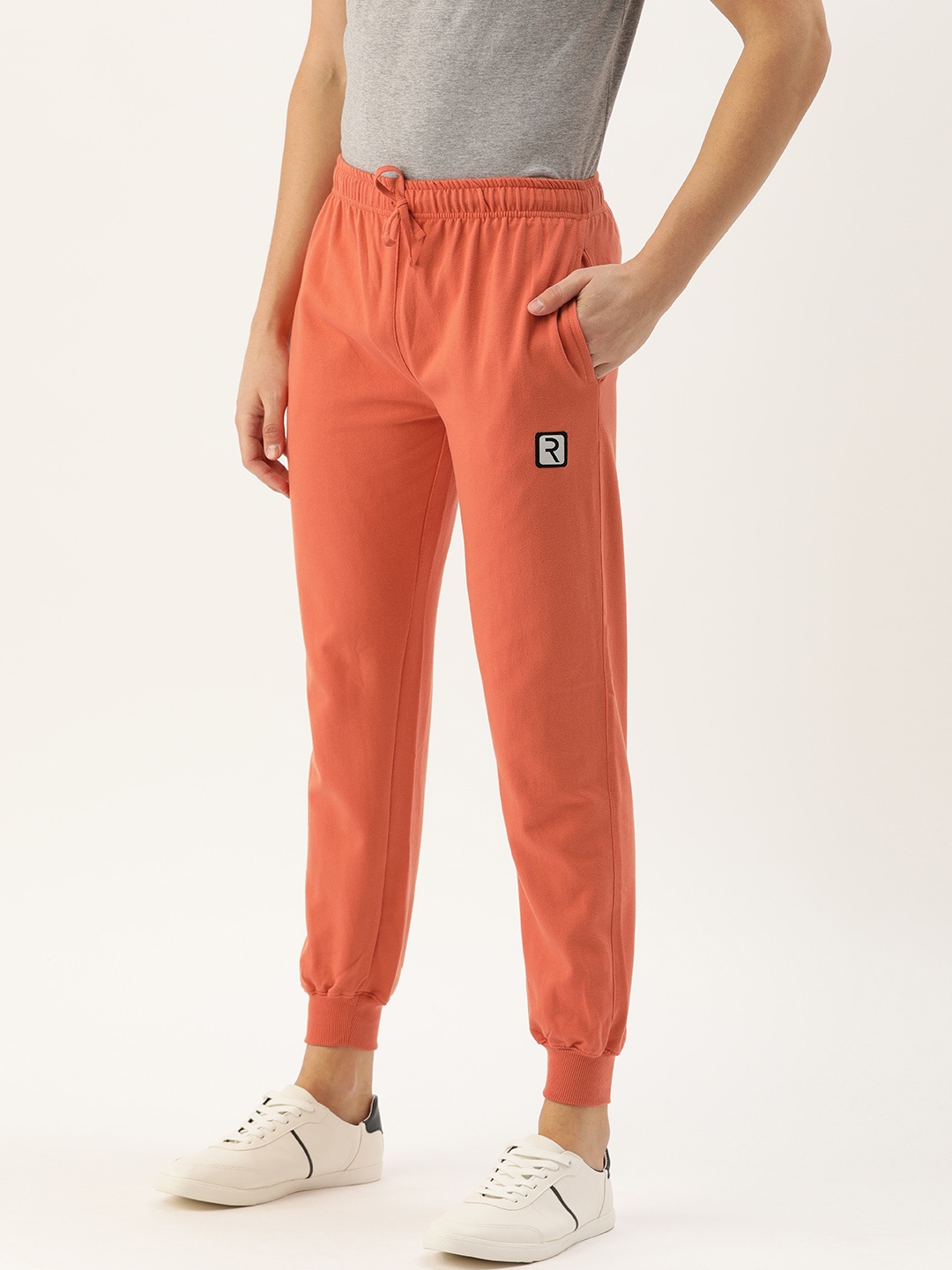 

Rodzen Men Orange Solid Straight Fit Casual Joggers With Applique Detailing
