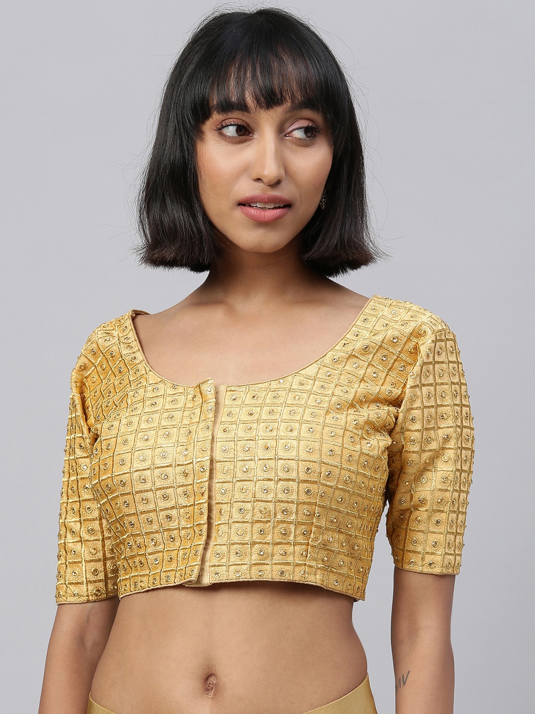 

Amrutam Fab Women Gold-Toned Embellished Saree Blouse
