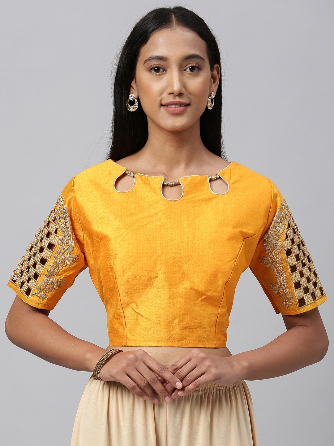

Amrutam Fab Women Mustard Yellow Solid Saree Blouse with Embroidered Detailed Sleeve