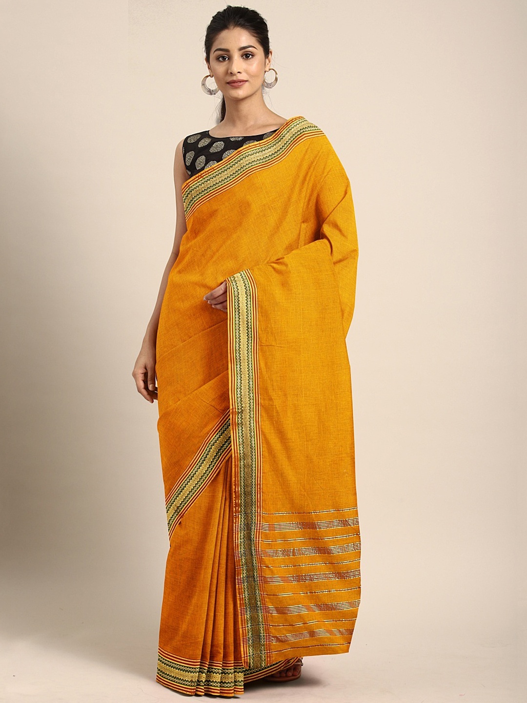 

Pavechas Mustard Yellow Pure Cotton Solid Venkatgiri Saree