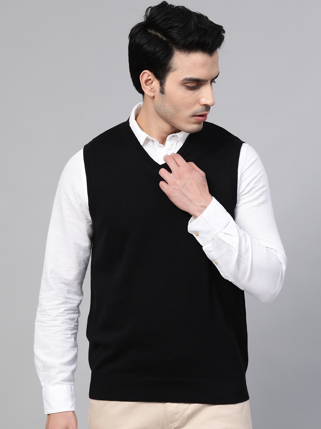 

Marks & Spencer Men Black Solid Sweater Vest