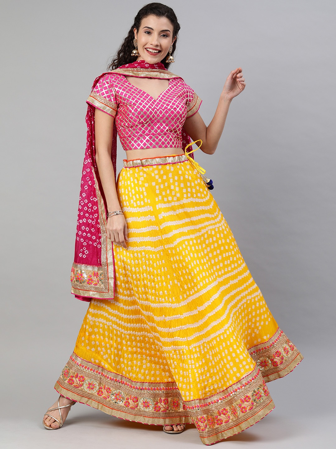 

Geroo Jaipur Hand Dyed Bandhani Yellow Silk Stitched Lehenga With Dupatta