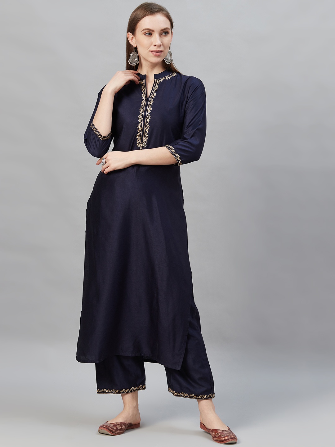 

Indo Era Women Navy Blue Zari Detail Solid Kurta with Palazzos