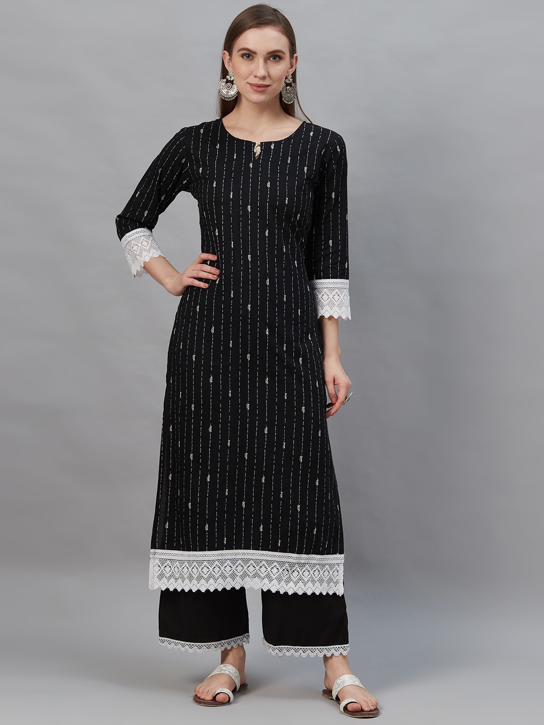 

Indo Era Women Black & White Striped Kurta with Palazzos