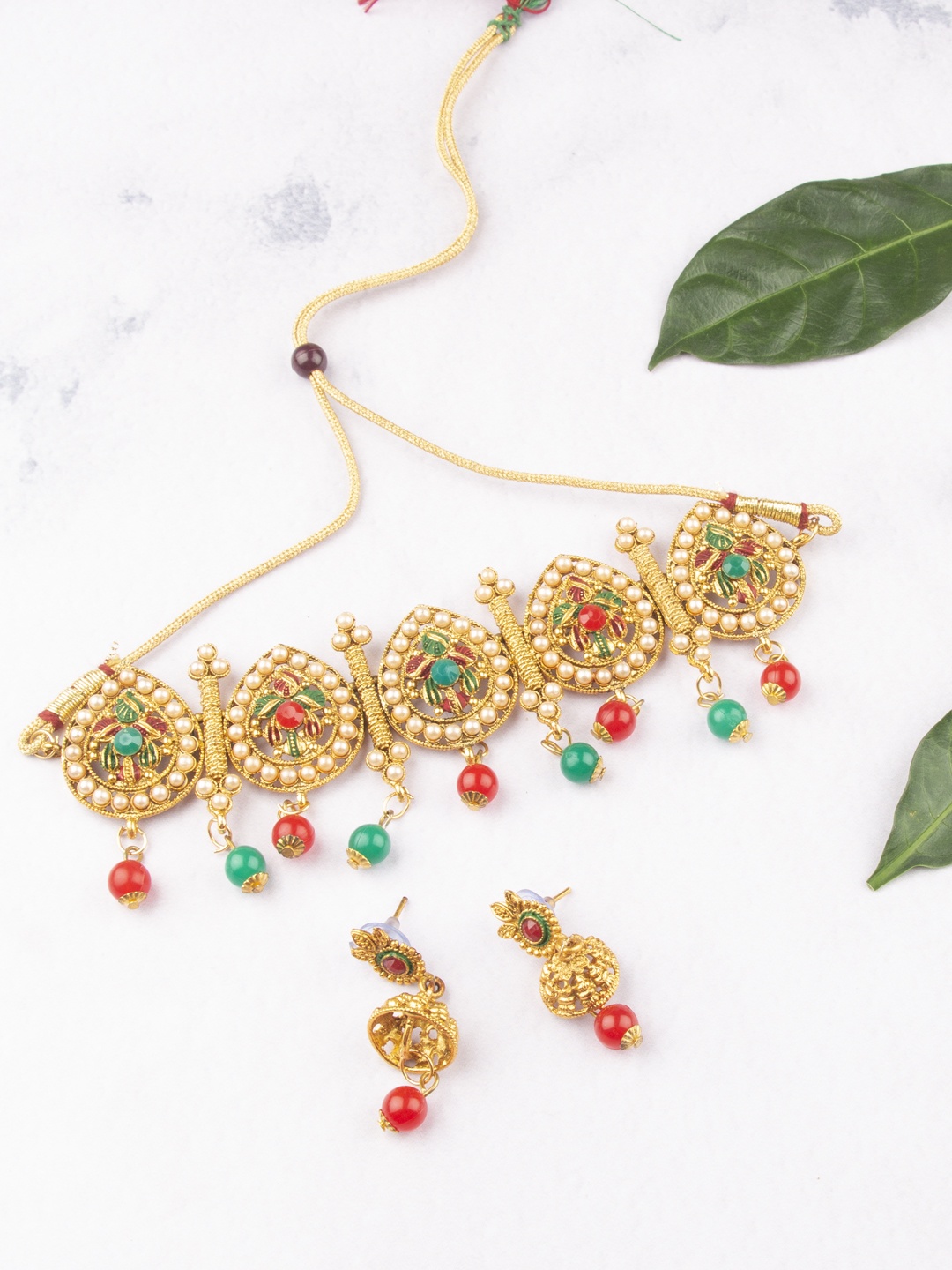 

AccessHer Women Gold-Toned & White Antique Jewellery Set