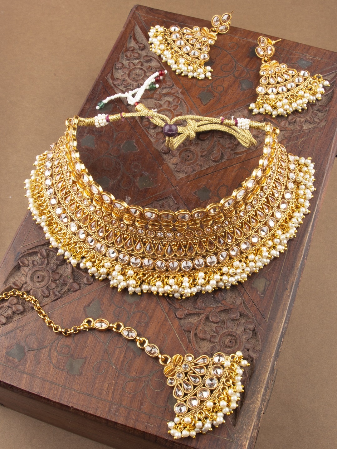 

AccessHer Women Gold-Plated & White Antique Jewellery Set