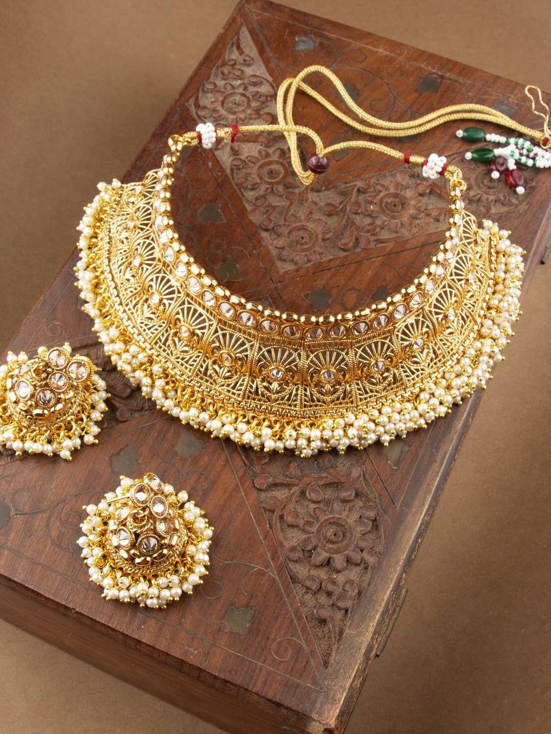 

AccessHer Women Gold-Plated Antique Studded Choker Jewellery Set