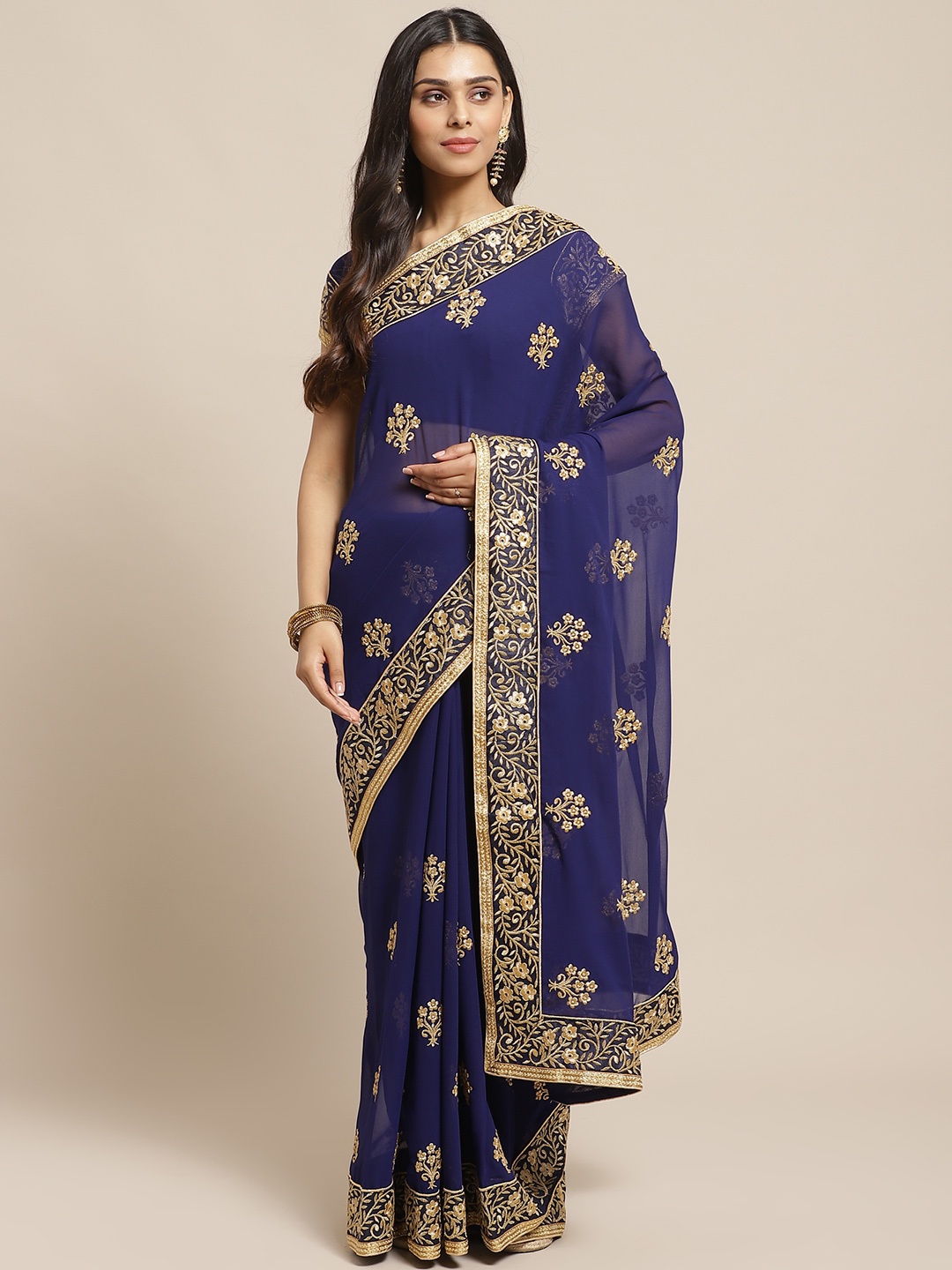 

Readiprint Fashions Navy Blue & Golden Embroidered Saree