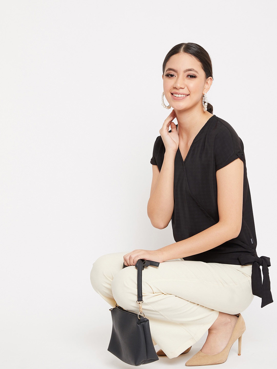 

Crimsoune Club Women Black Solid Top