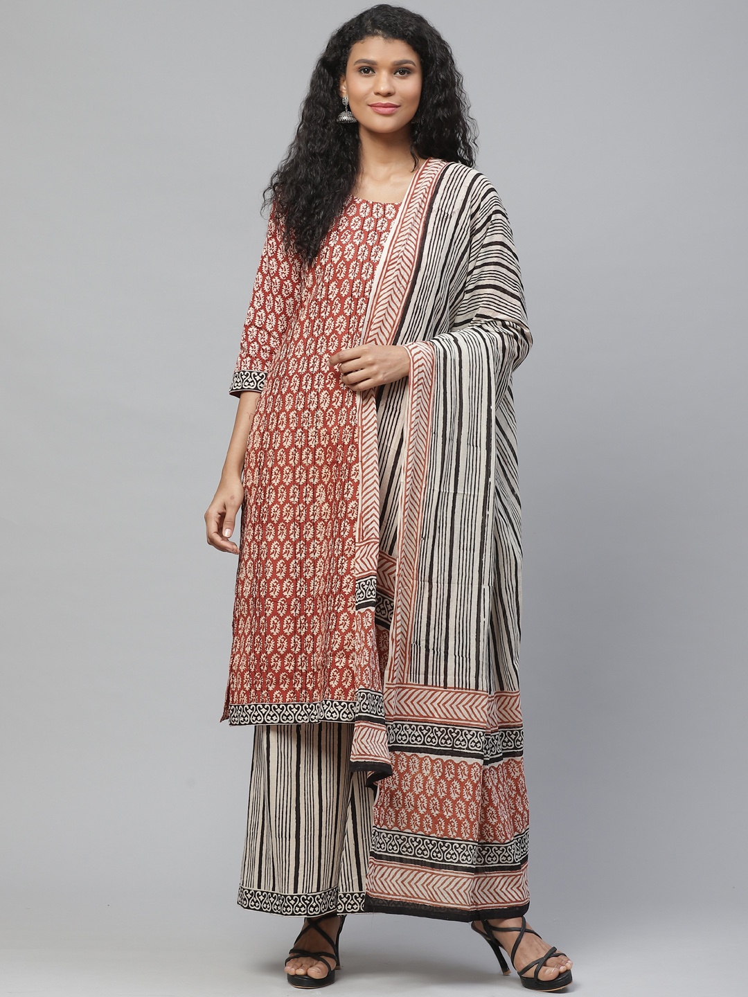 

Readiprint Fashions Rust Orange & Beige Printed Unstitched Dress Material