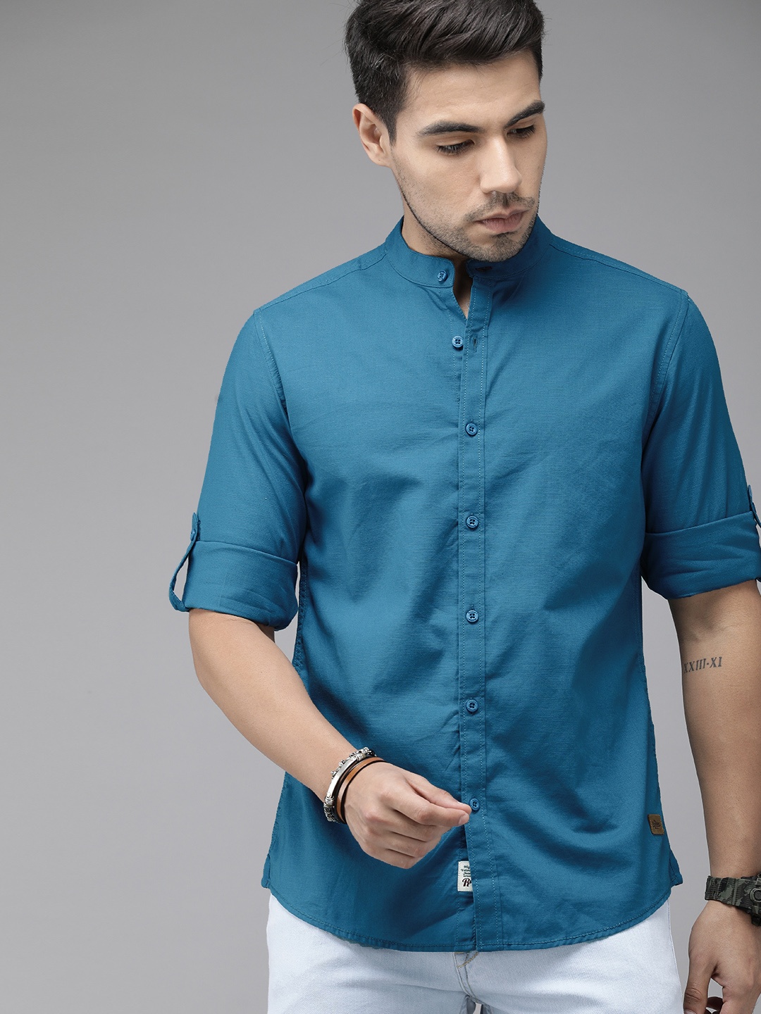 

Roadster Men Teal Blue Regular Fit Solid Casual Shirt