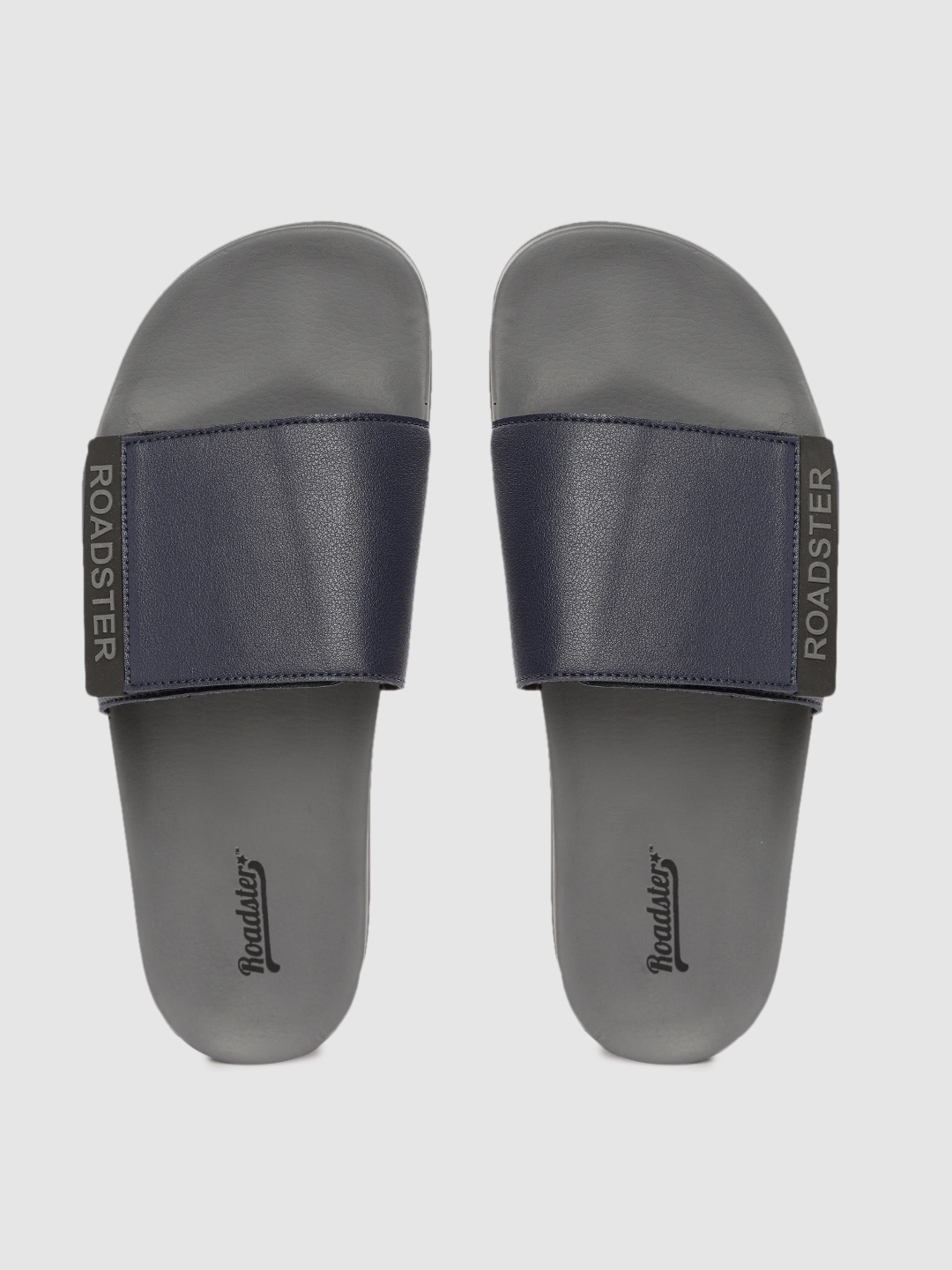 

Roadster Men Navy Blue Solid Sliders
