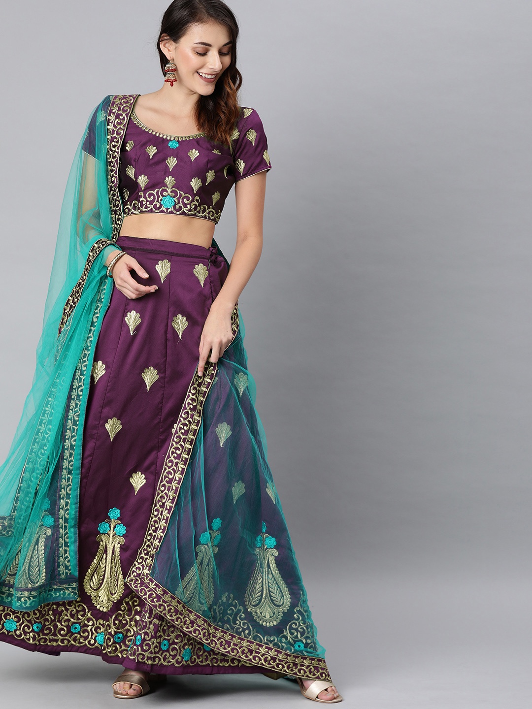 

Mitera Purple & Teal Embroidered Semi-Stitched Lehenga & Unstitched Blouse with Dupatta