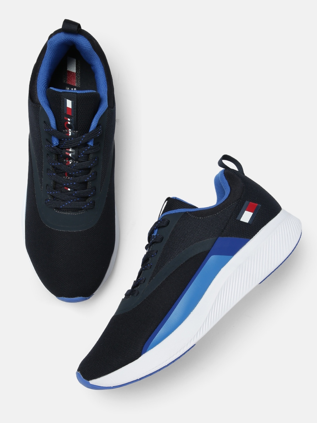 

Tommy Hilfiger Men Navy Blue Solid Sneakers