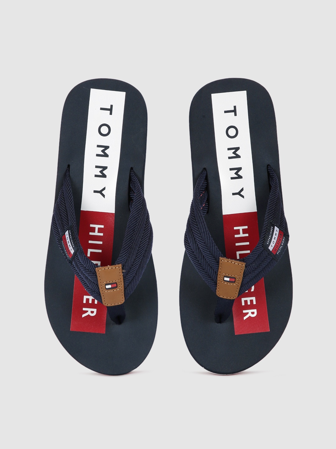 

Tommy Hilfiger Men Navy Blue Printed Thong Flip-Flops