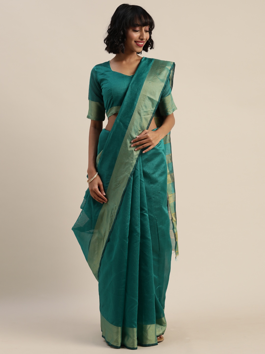 

Silk Bazar Green Solid Silk Cotton Saree