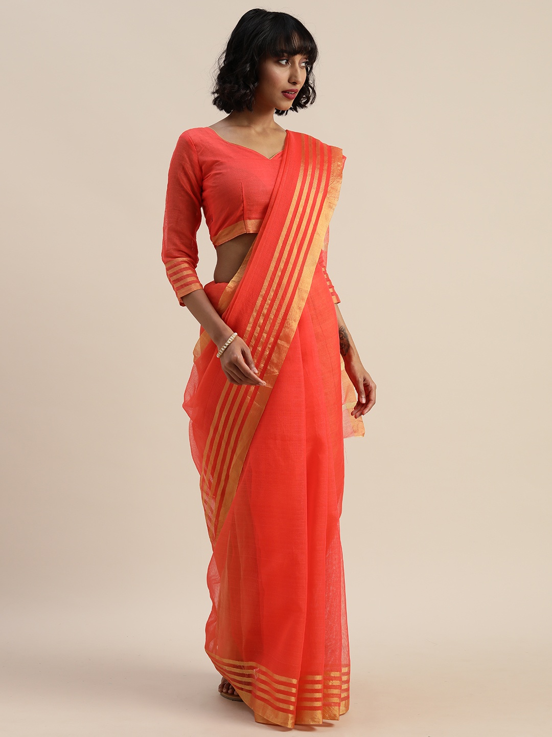 

Silk Bazar Orange Cotton Blend Solid Kota Saree