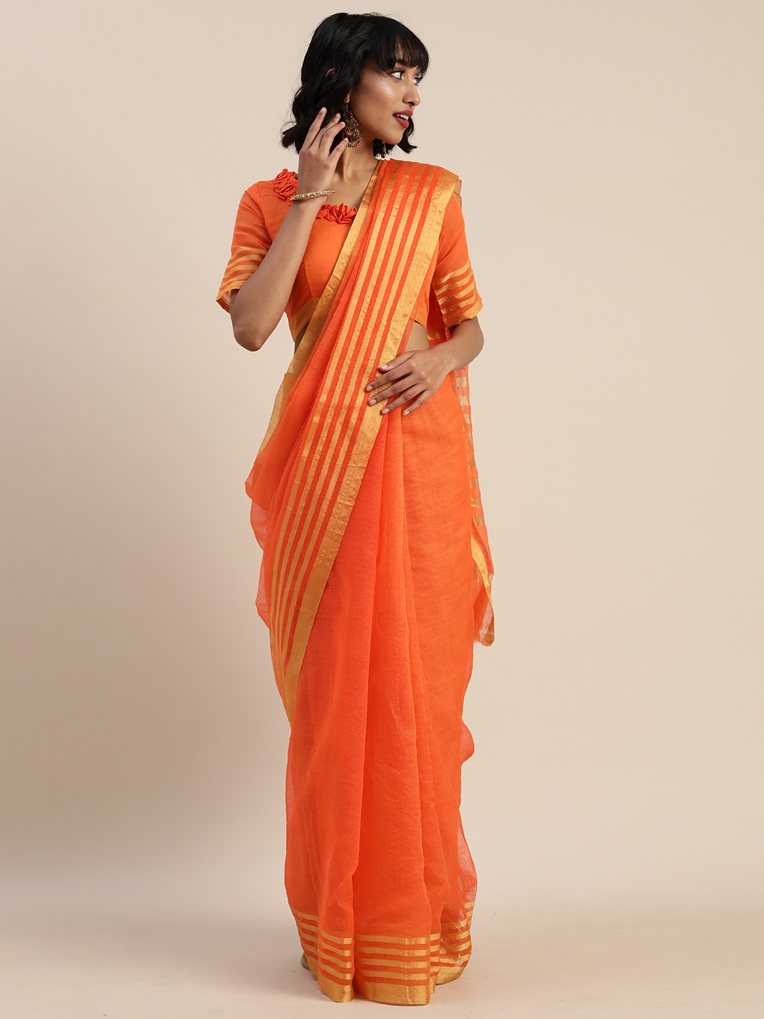 

Silk Bazar Orange Cotton Blend Solid Kota Saree