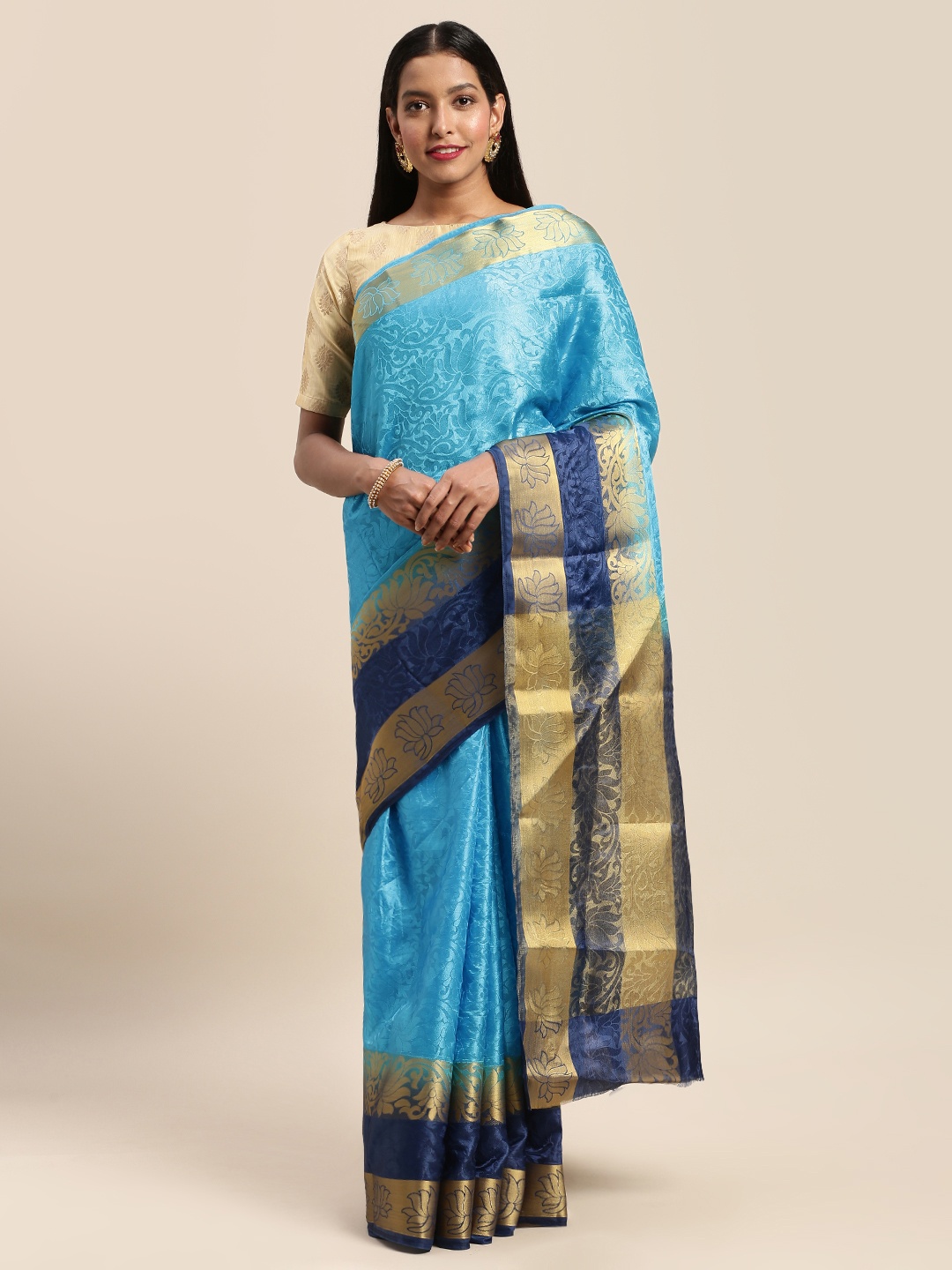 

Mitera Blue Woven Design Brasso Saree