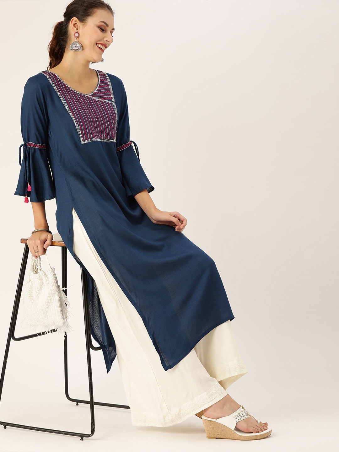 

Varanga Women Blue & Pink Solid Straight Kurta