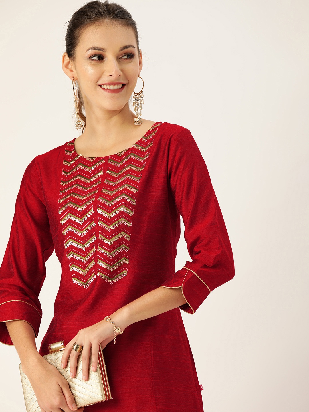 

Varanga Women Maroon & Green Solid Straight Kurta