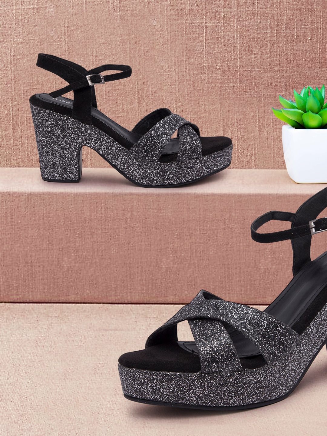 

Rocia Women Black Solid Sandals