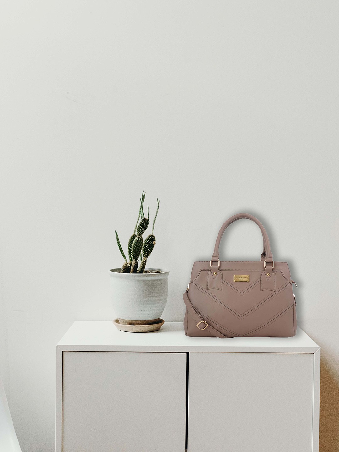 

Lapis O Lupo Mauve Striped Handheld Bag