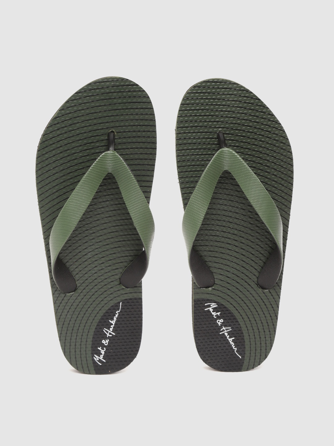 

Mast & Harbour Men Olive Green & Black Striped Thong Flip-Flops with Textured Detail