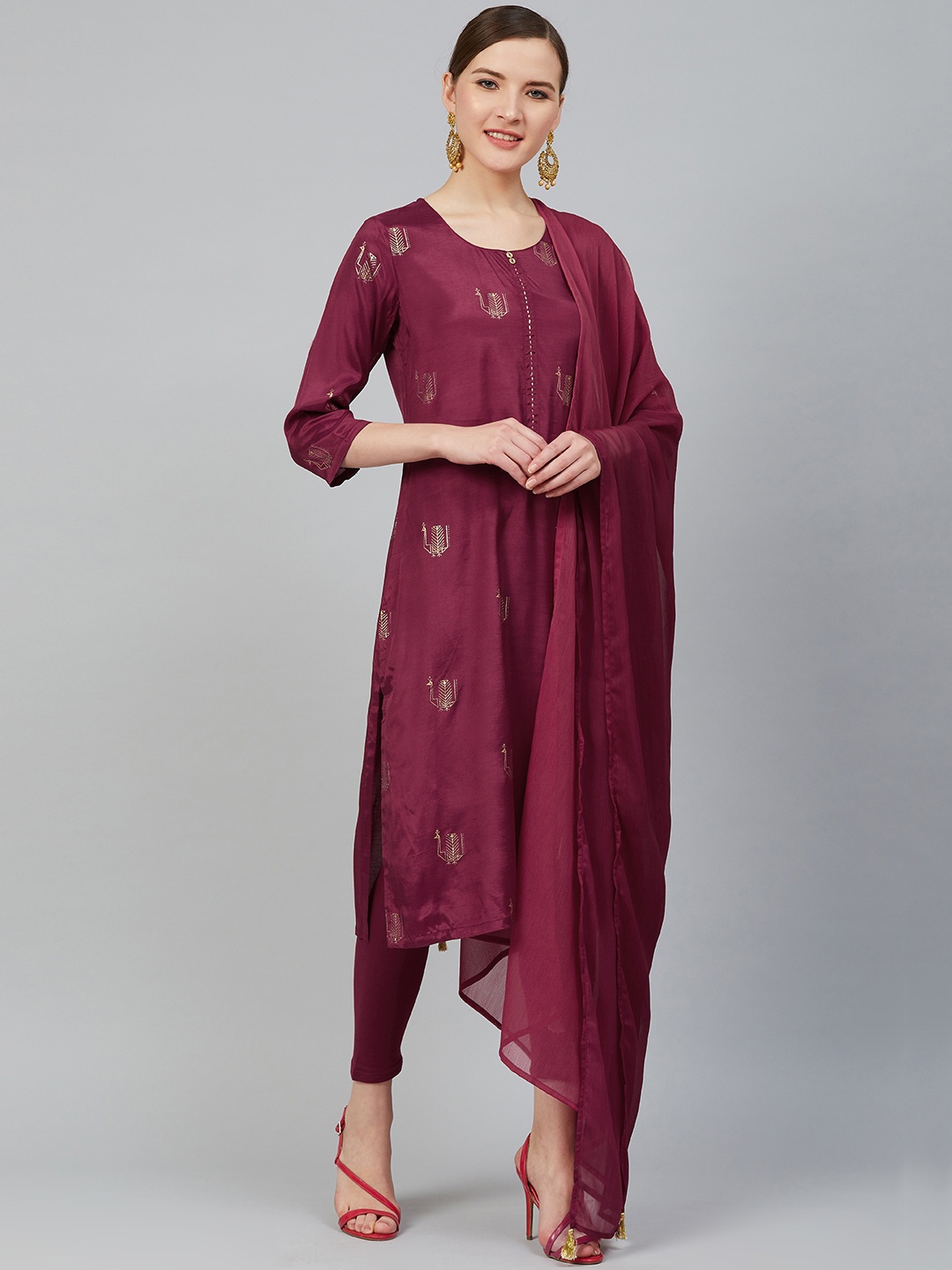 

Rangriti Women Burgundy & Golden Printed Kurta with Leggings & Dupatta