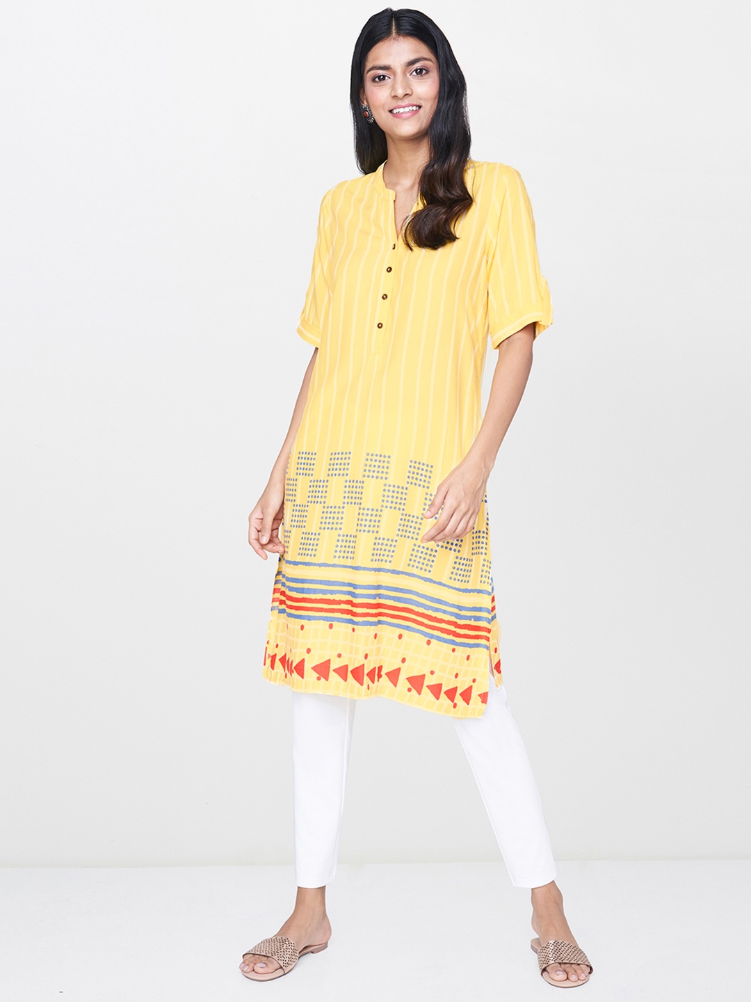 

Global Desi Women's Yellow & White Striped Tunic