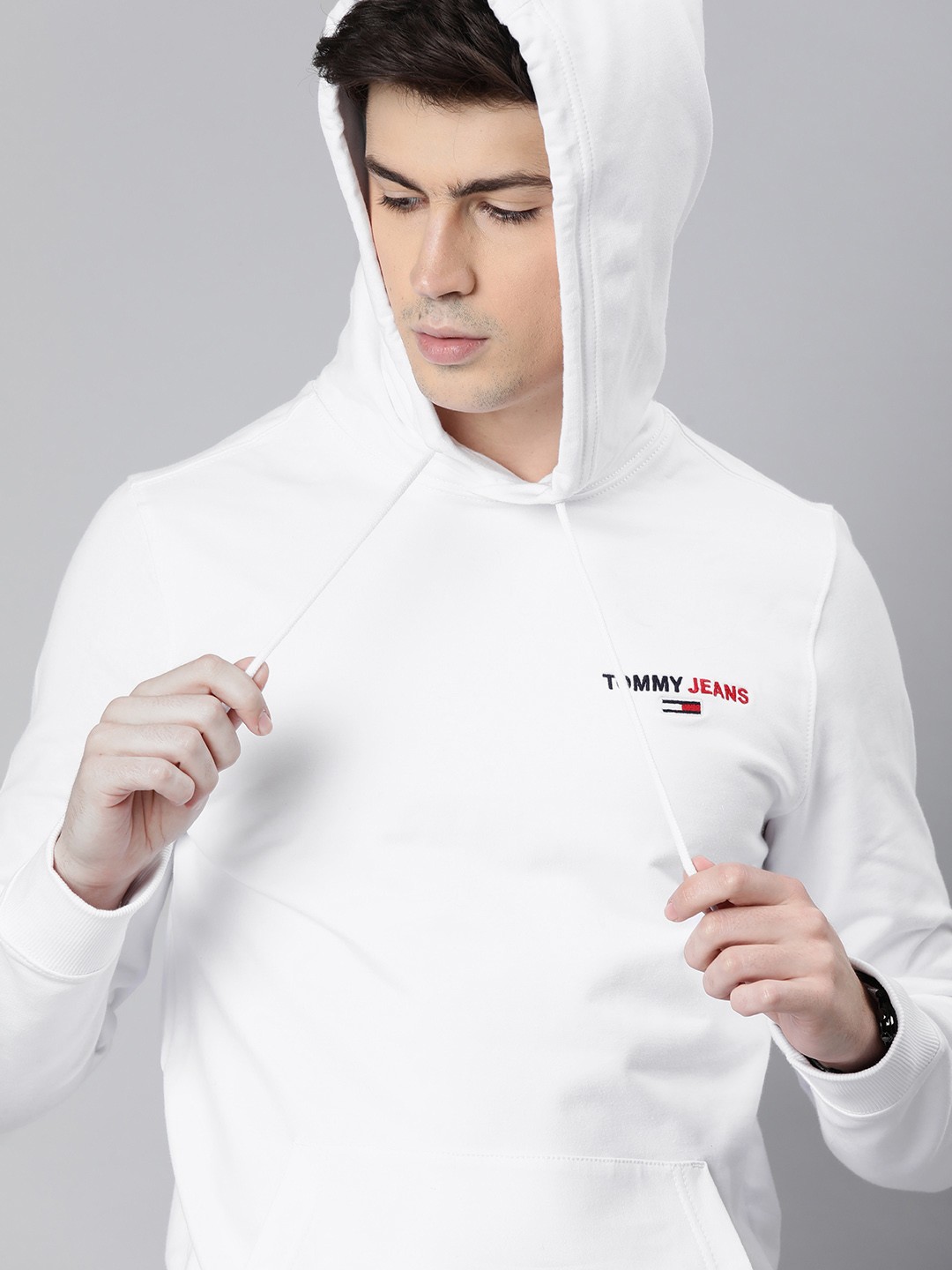 

Tommy Hilfiger Men White Solid Hooded Sweatshirt with Embroidered Detail