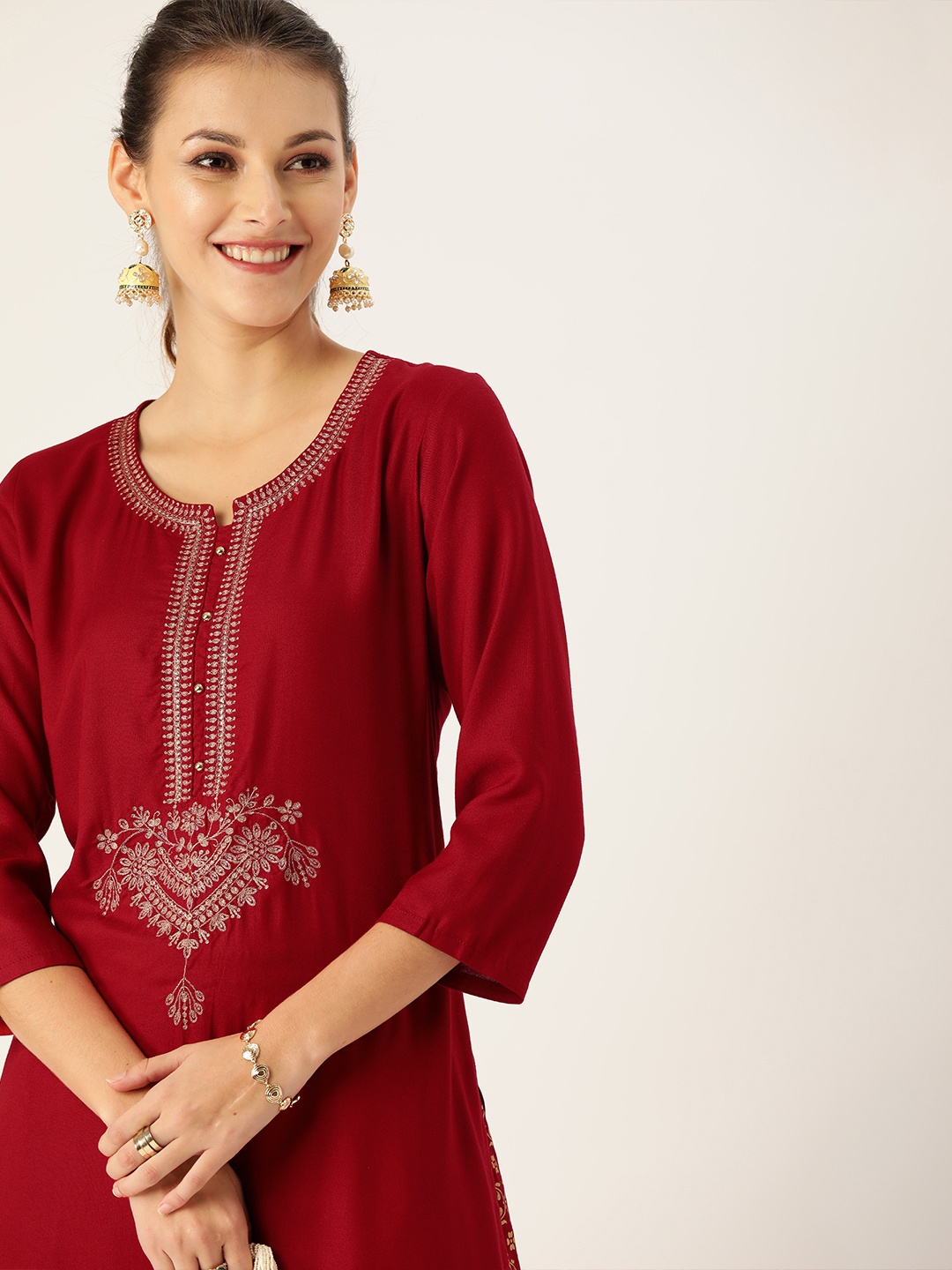 

Varanga Women Maroon & Gold-Coloured Embroidered Kurta with Palazzos