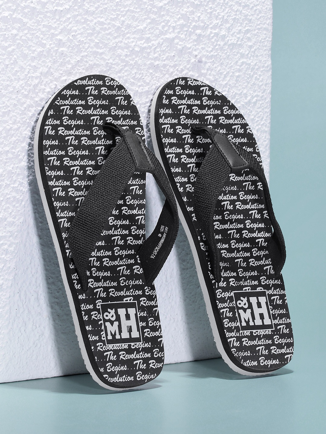 

Mast & Harbour Men Black & Grey Printed Thong Flip-Flops