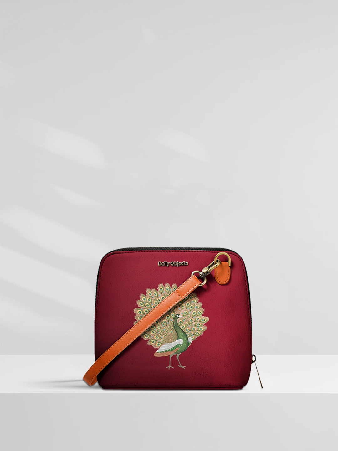 

DailyObjects Maroon Printed Sling Bag