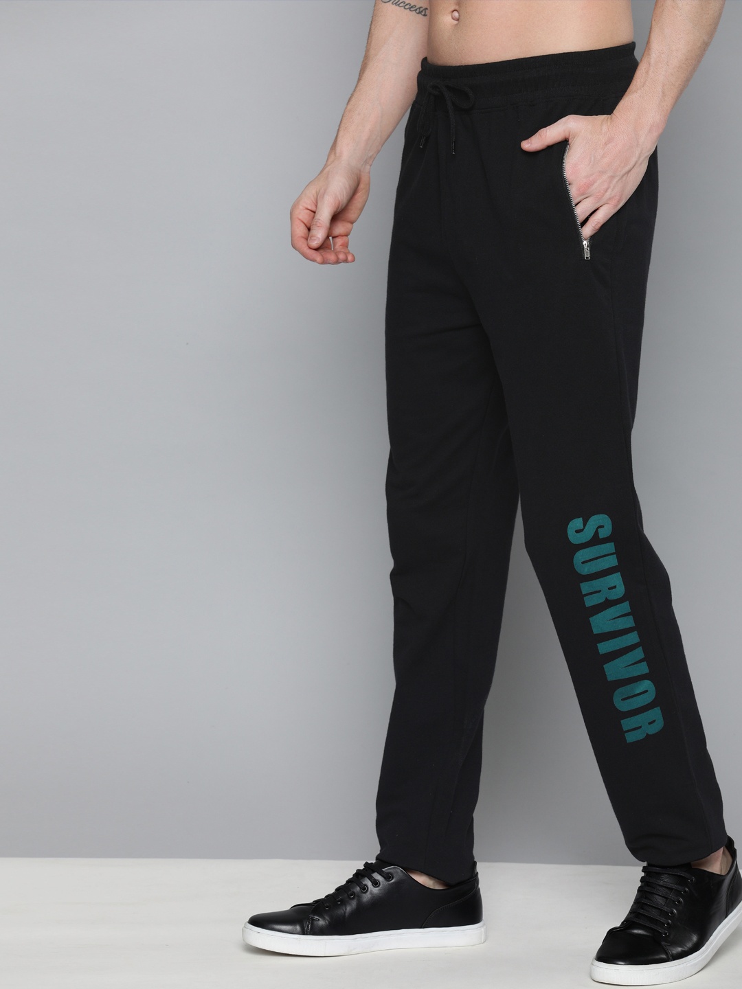 

HERE&NOW Men Black Solid Track Pants