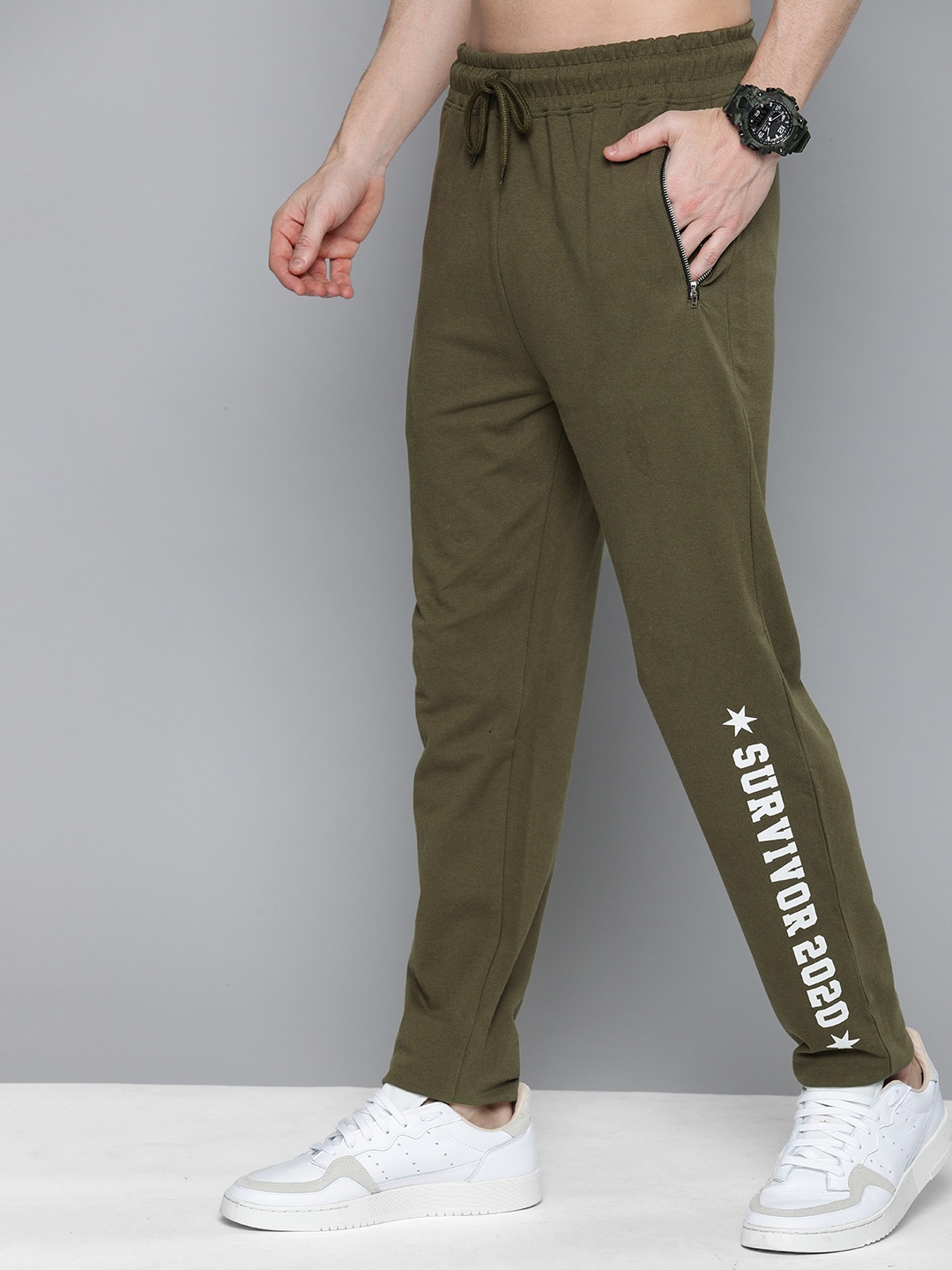 

HERE&NOW Men Olive Green Solid Regular Fit Track Pants with Printed Detail