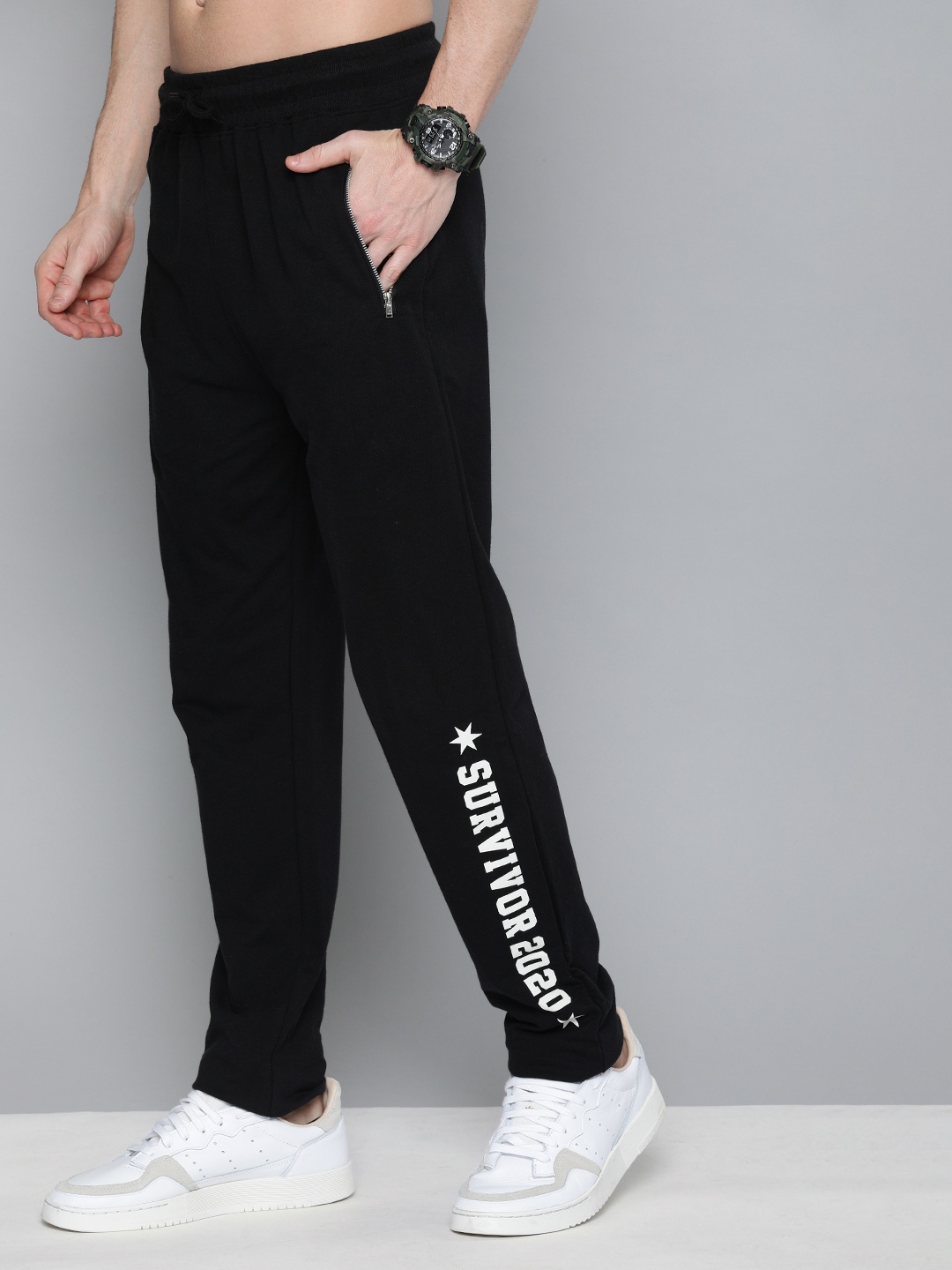 

HERE&NOW Men Black Solid Regular Fit Track Pants with Printed Detail