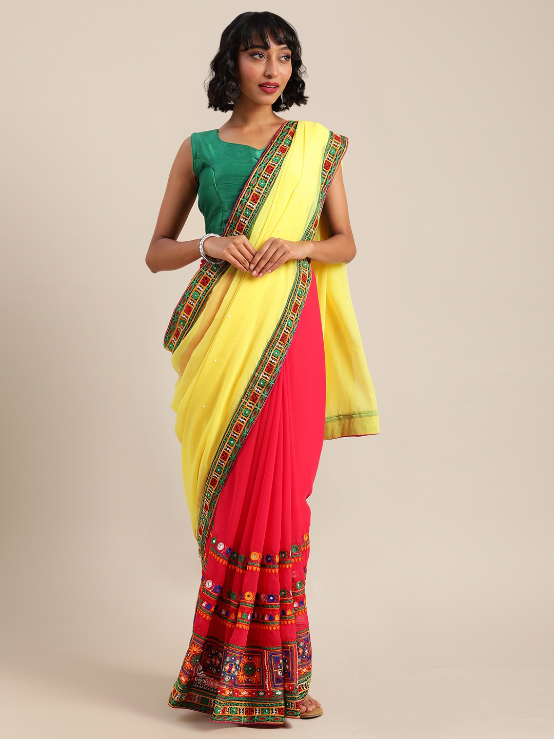 

Mitera Yellow & Coral Pink Pure Georgette Embellished Saree
