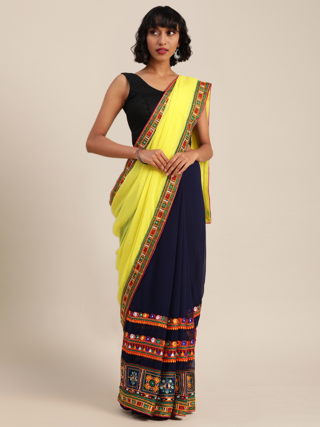

Mitera Yellow & Navy Blue Pure Georgette Embellished Saree
