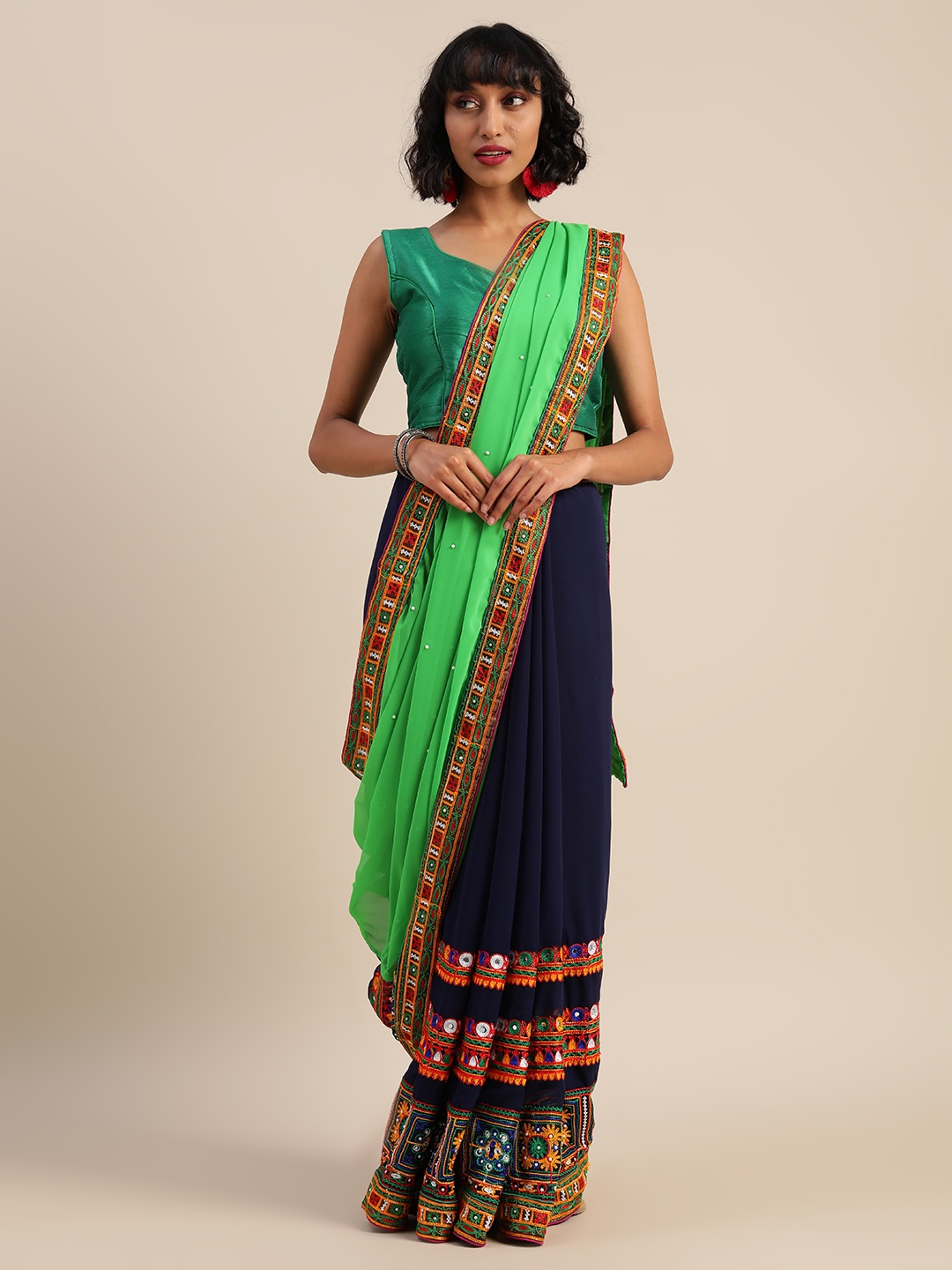 

Mitera Green & Navy Blue Pure Georgette Embroidered Saree