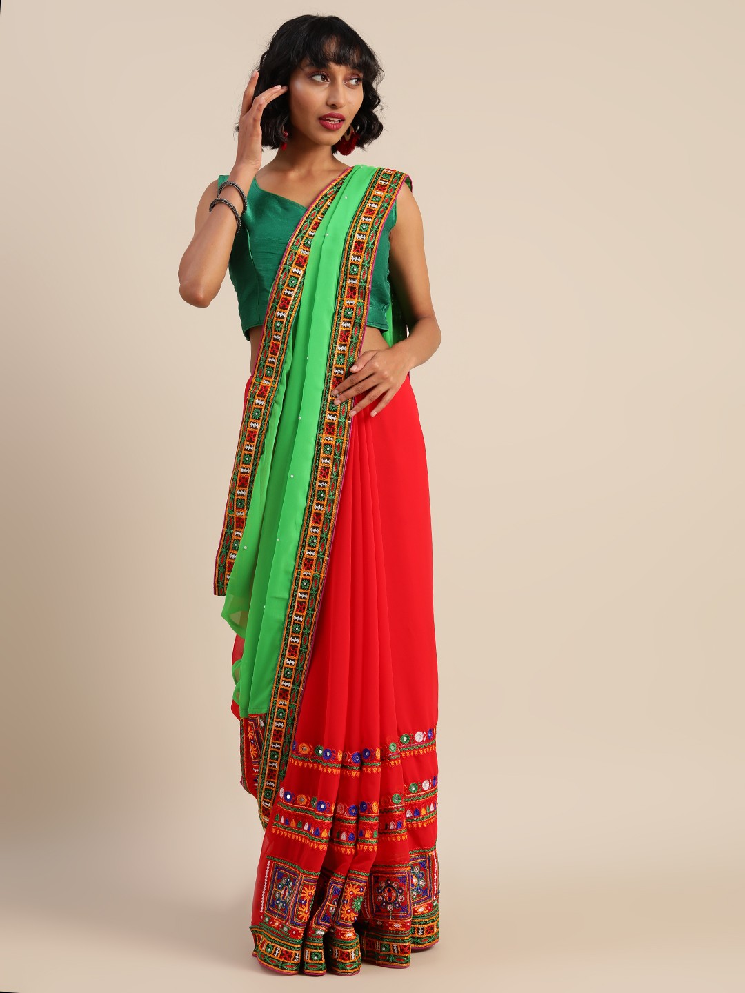 

Mitera Orange & Green Pure Georgette Solid Saree