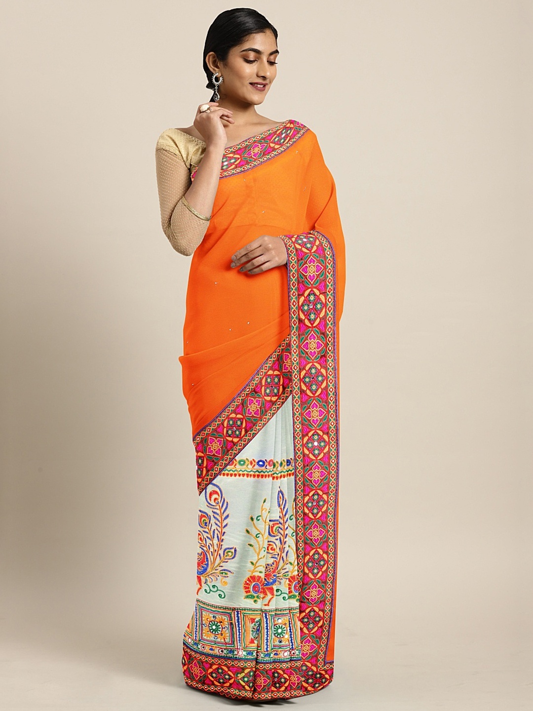 

Mitera Orange & White Heavy Kutchi Work With Peacock Design Embroidered Saree